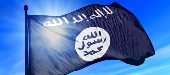 Islamic State flag waving on the wind Estado Islâmico EI ISIS
