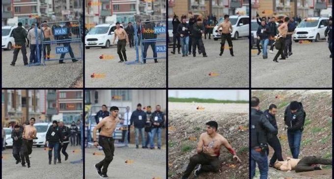 Policial turco fotografado matando estudante curdo está livre